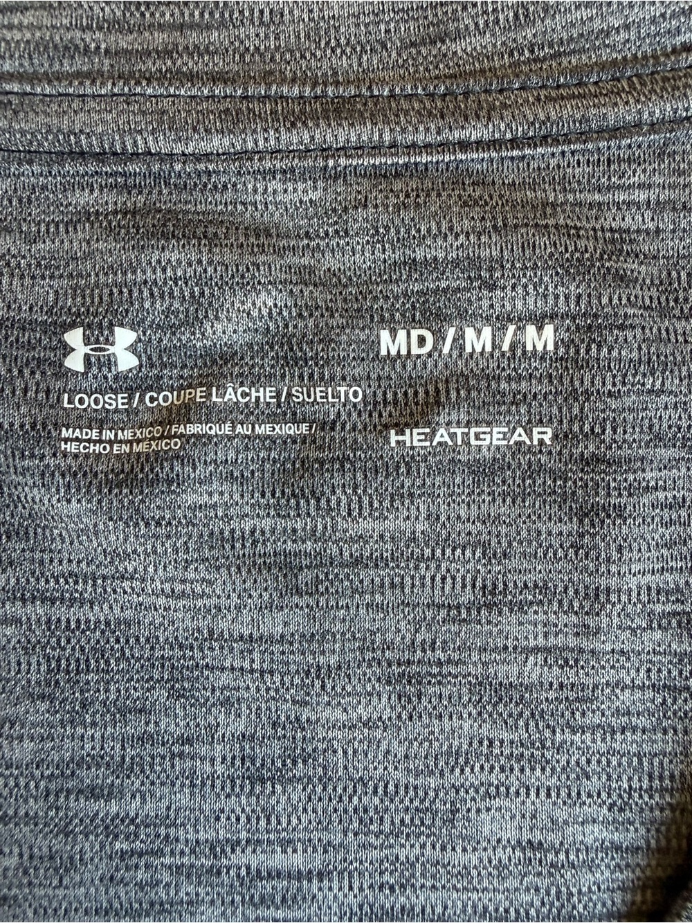 Under Armour HeatGear Women's Medium Gray
Loose Fit V-Neck Athletic Shirt - Picture 4 of 7
